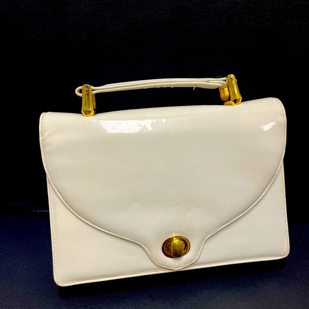 Vintage white leather handbag by Neusteters.